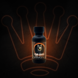 A brown bottle of pup juice poppers infront of a crown with a dark background